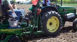 Large ndsu team members on tractor